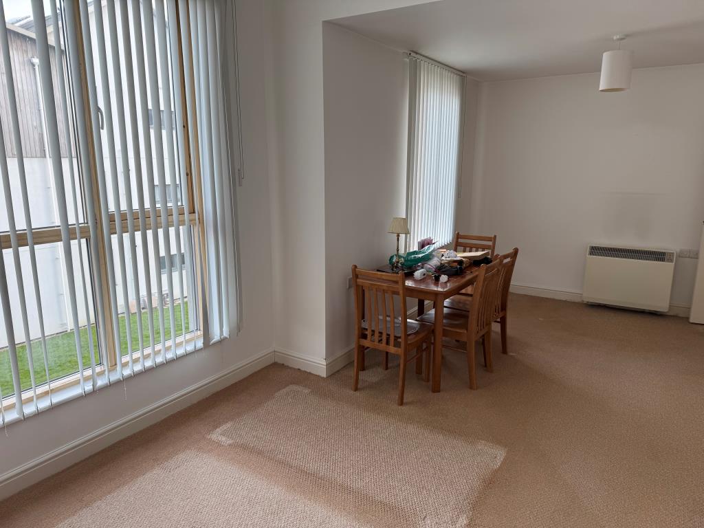 Lot: 128 - TWO-BEDROOM FLAT WITH PARKING FOR INVESTMENT OR OCCUPATION - Looking Back at the Dining Area